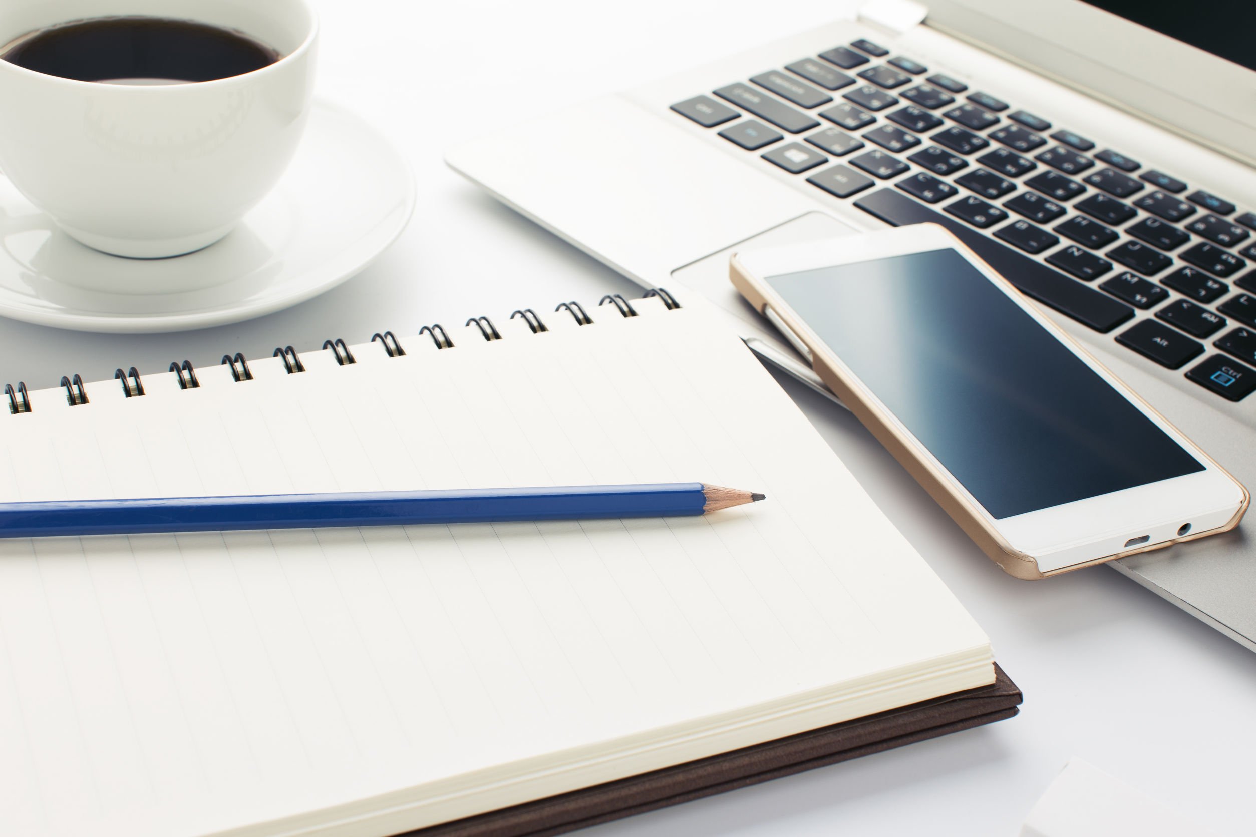 41194142 – blue pencil with book and cup of coffee on white background